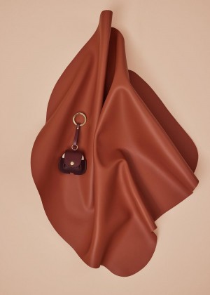 Polene Airpods case Bordeaux | Italia_P21874